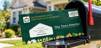 Our Town America new mover envelope in a mailbox