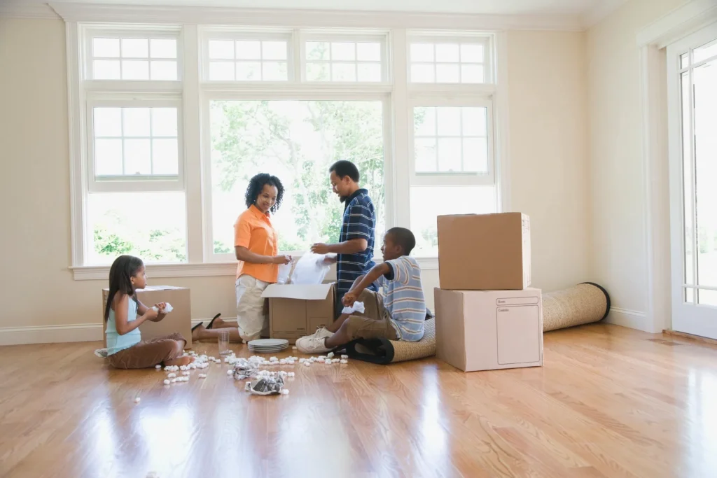 Family moving into a new home representing new mover marketing opportunities for local businesses
